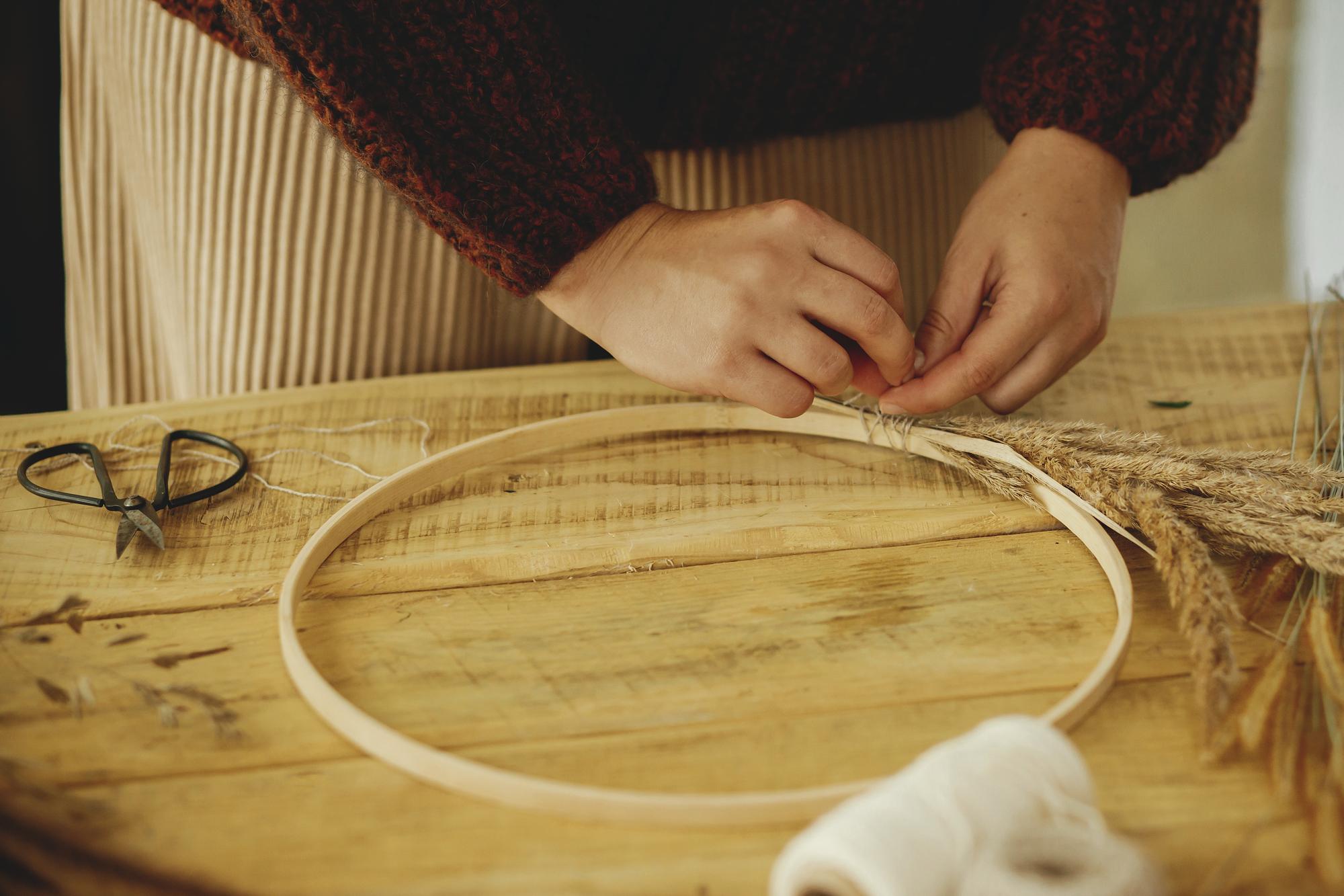 Artisan embroidery workspace with threads and hoop